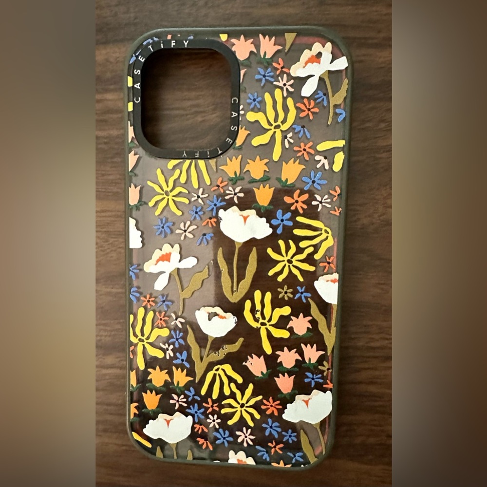 Casetify case with beautiful floral design and olive green bumper. Toug…